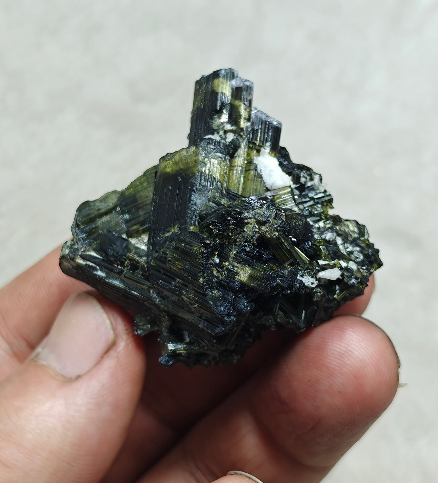 Dark green color Tourmaline crystal with chatoyance effect 50 grams