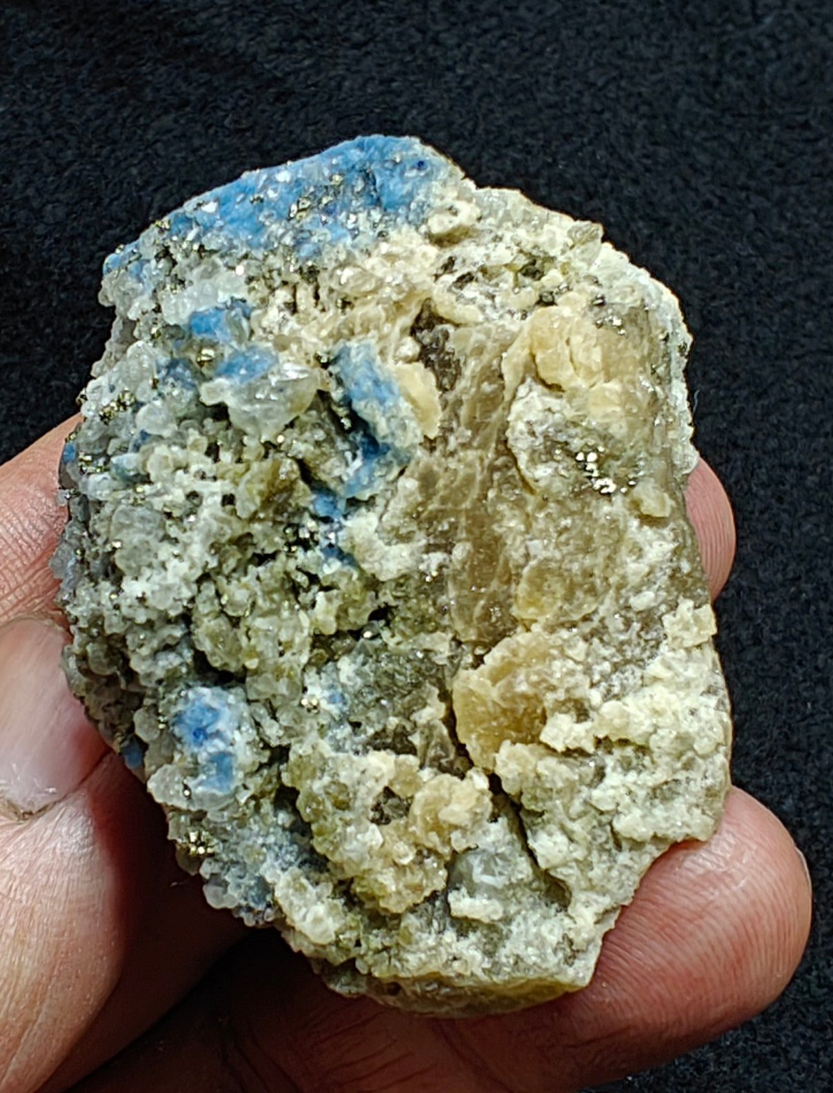Afghanite Fluorescent in matrix with some pyrite calcite 88 grams