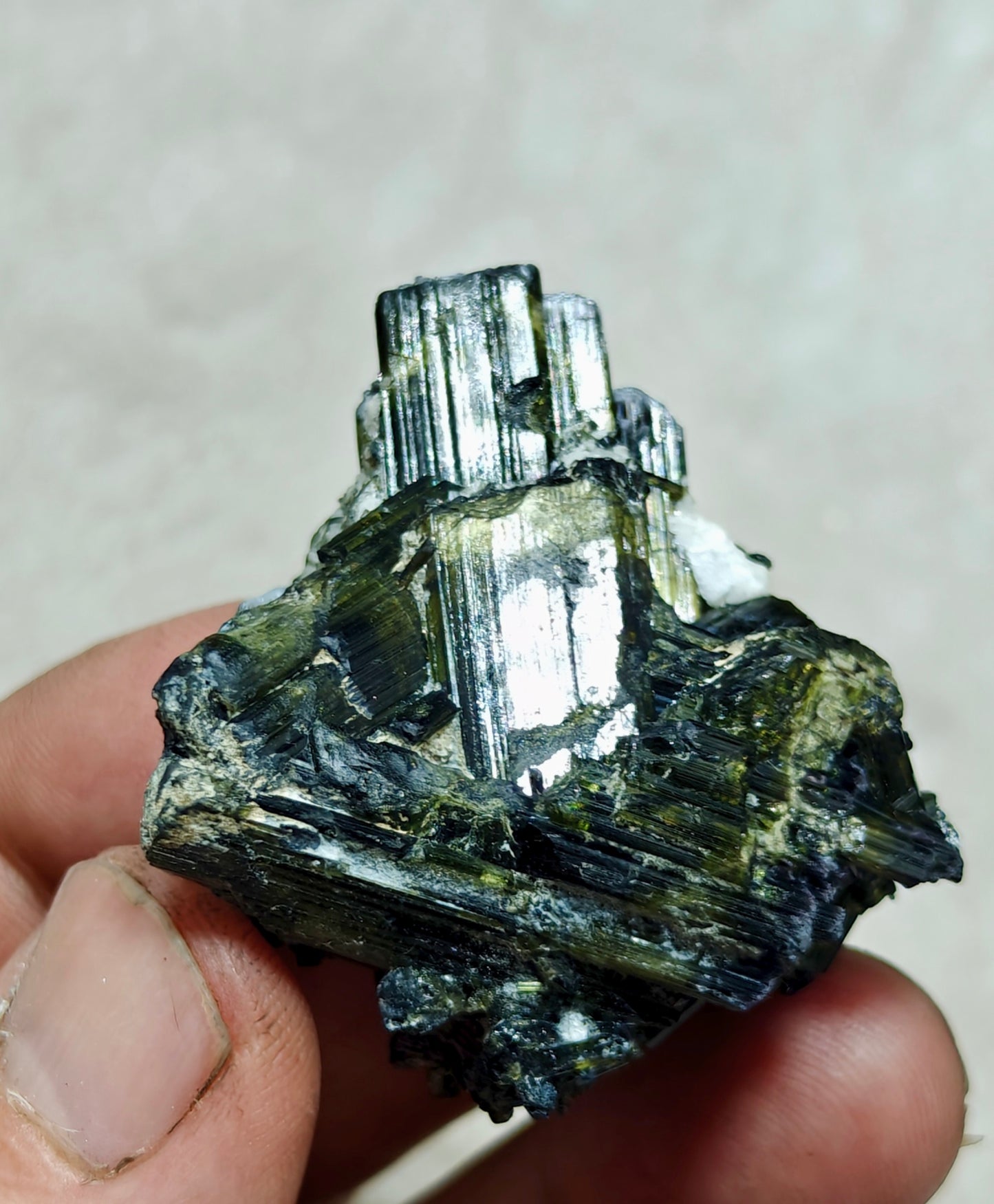 Dark green color Tourmaline crystal with chatoyance effect 50 grams