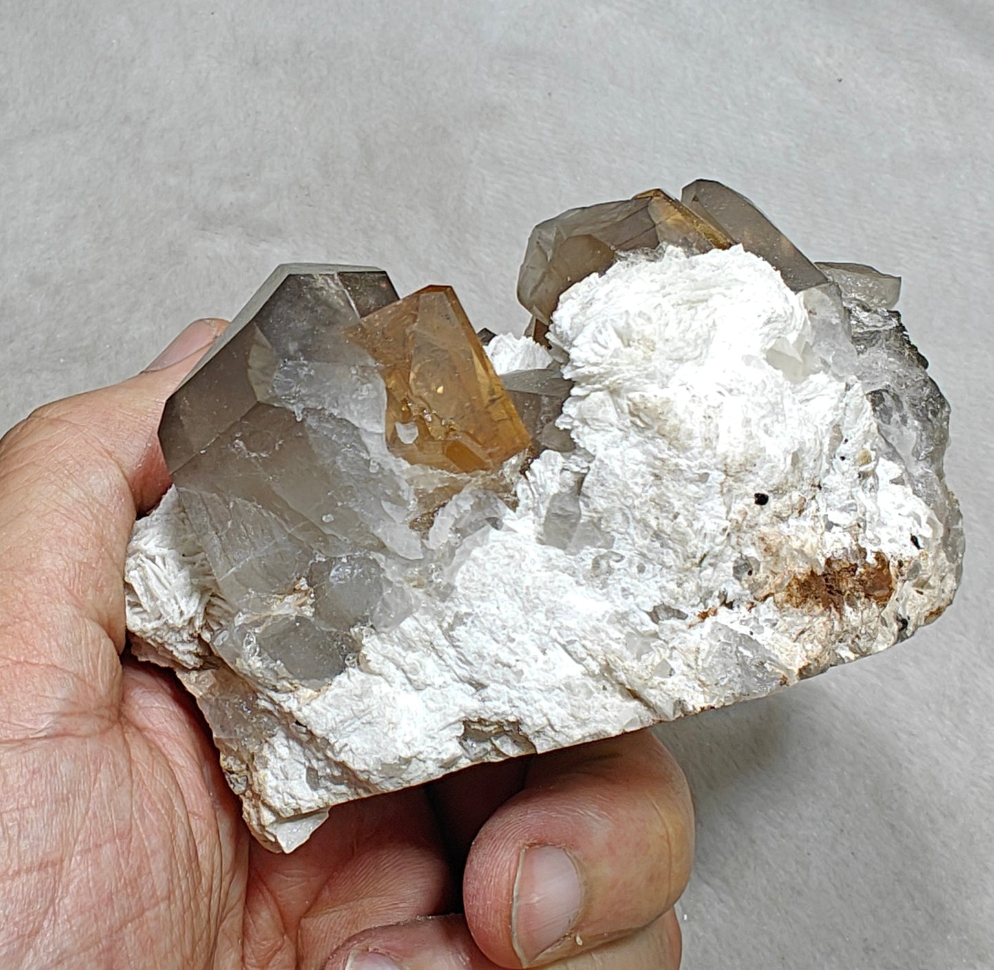 Natural peach color Topaz crystals on matrix with smoky quartz 455 grams