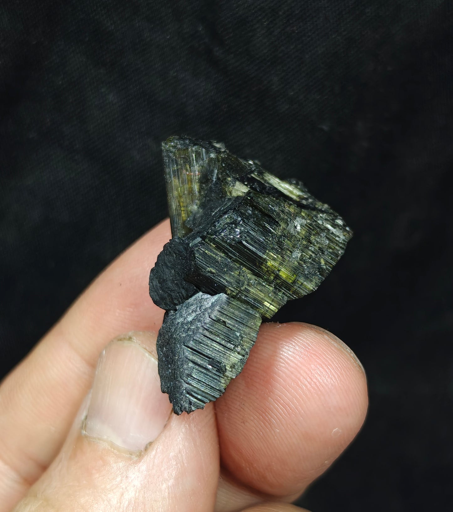 Dark green color Tourmaline with chatoyance effect 19 grams