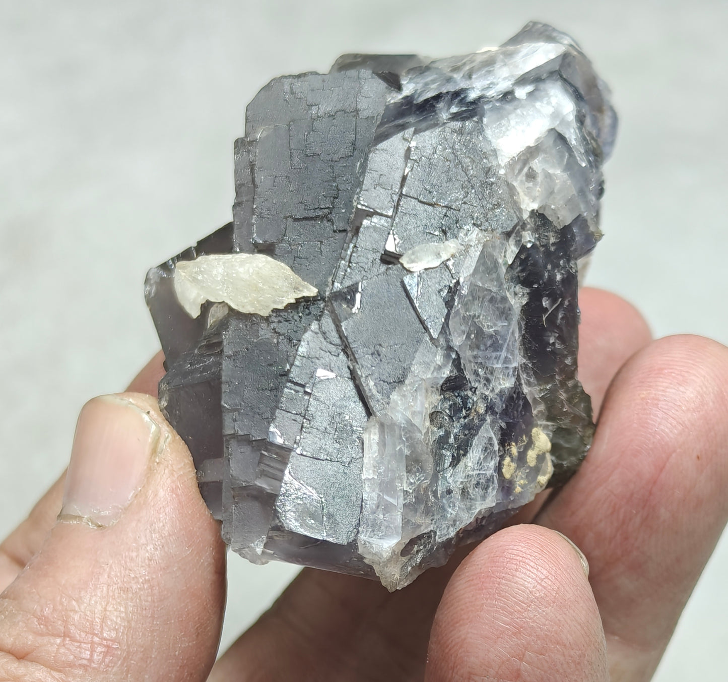 An amazing Single beautiful specimen of grey/purple fluorite with calcite crystals 150 grams
