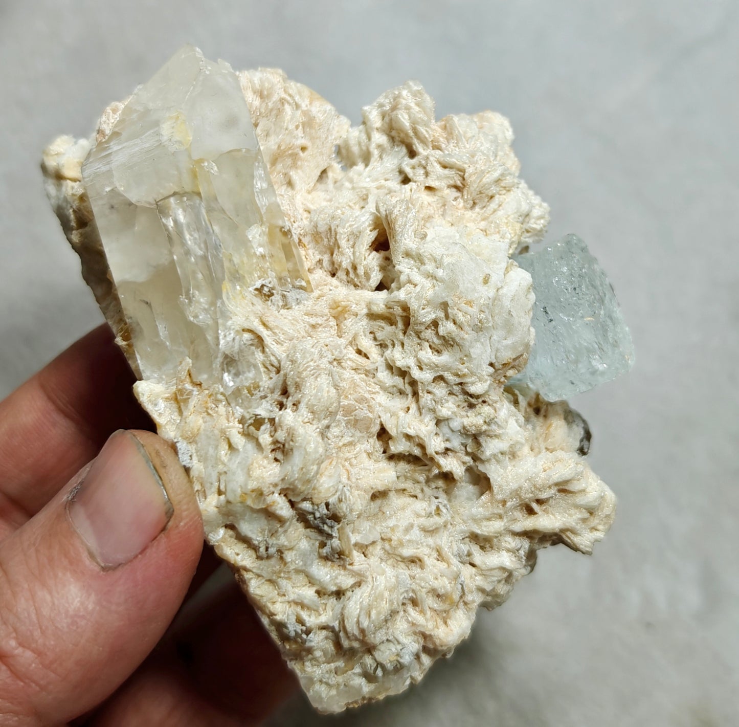 An aesthetic Specimen of etched Aquamarine on matrix with quartz 206 grams