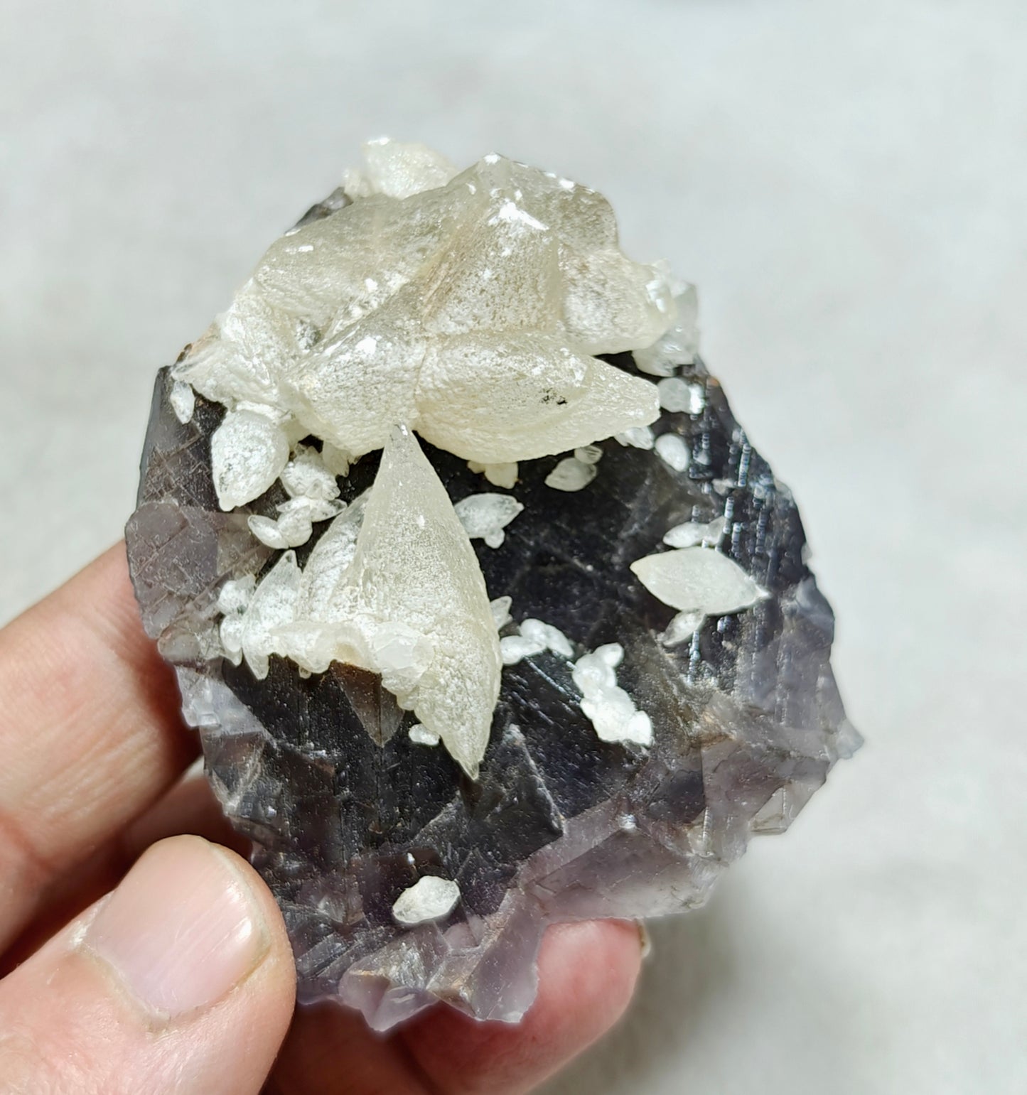 An amazing Single beautiful specimen of grey fluorite with calcite crystals 165 grams