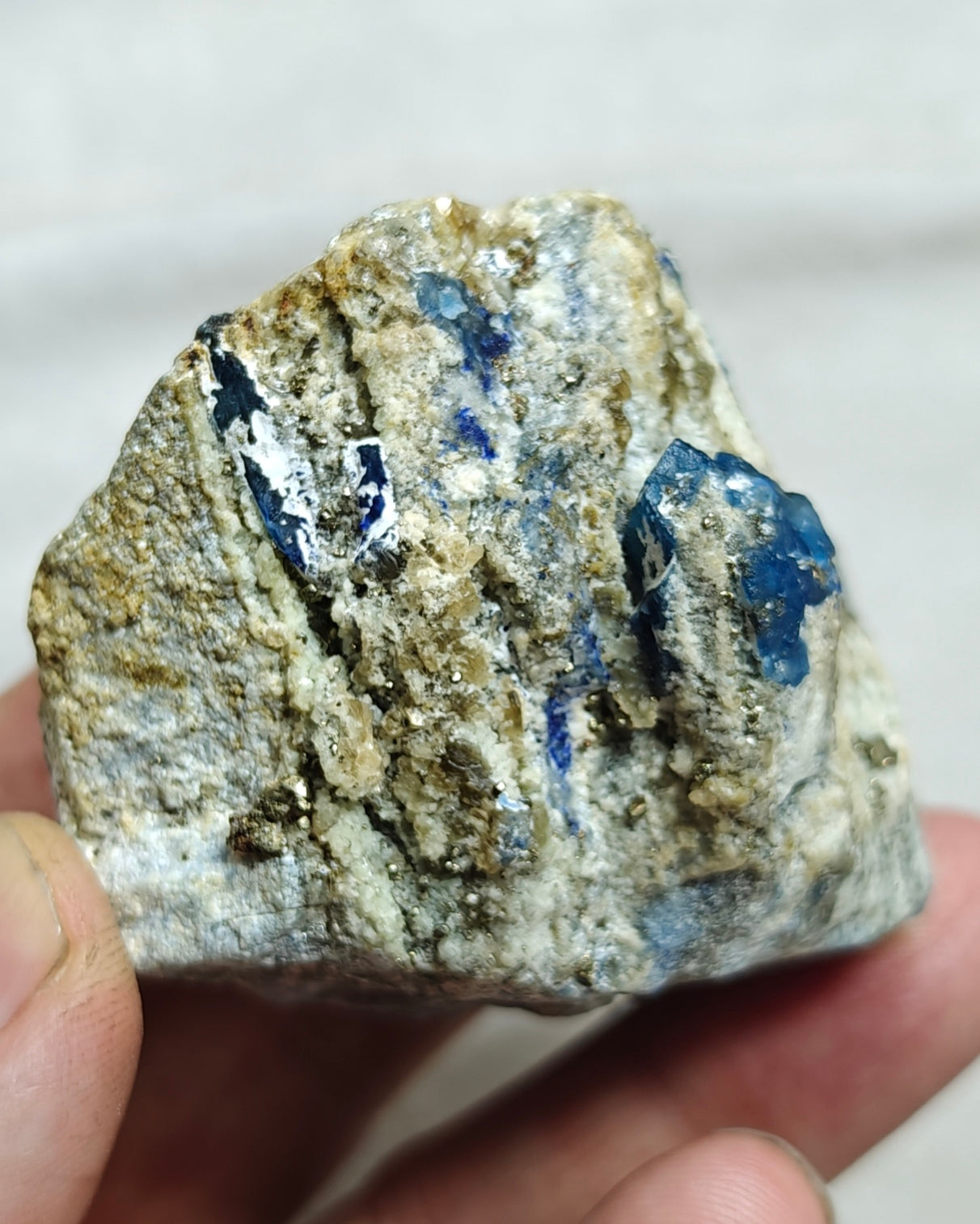 Afghanite Fluorescent in matrix with some pyrite 190 grams