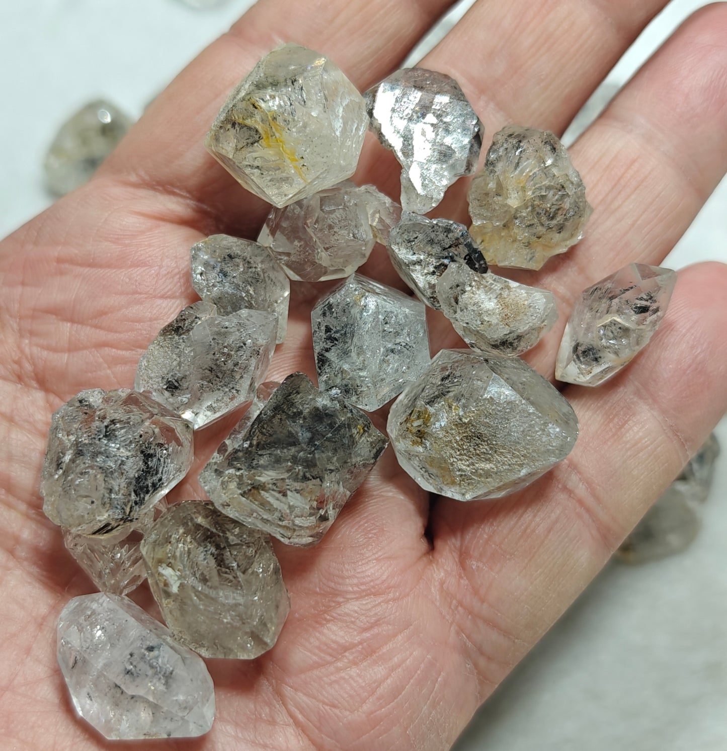 220 grams diamond quartz crystals some with carbon inclusions