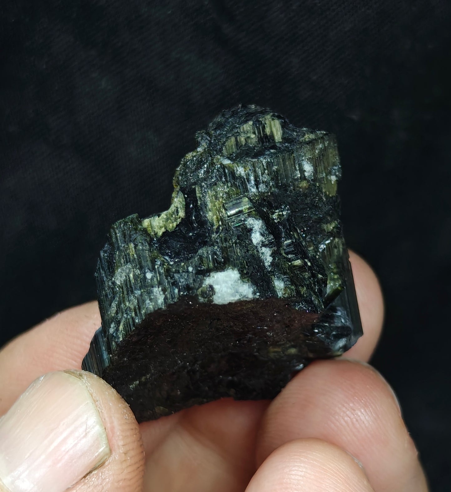 Dark green color Tourmaline with chatoyance effect 19 grams