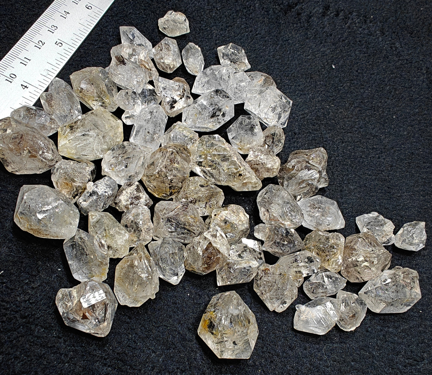 220 grams diamond quartz crystals some with carbon inclusions