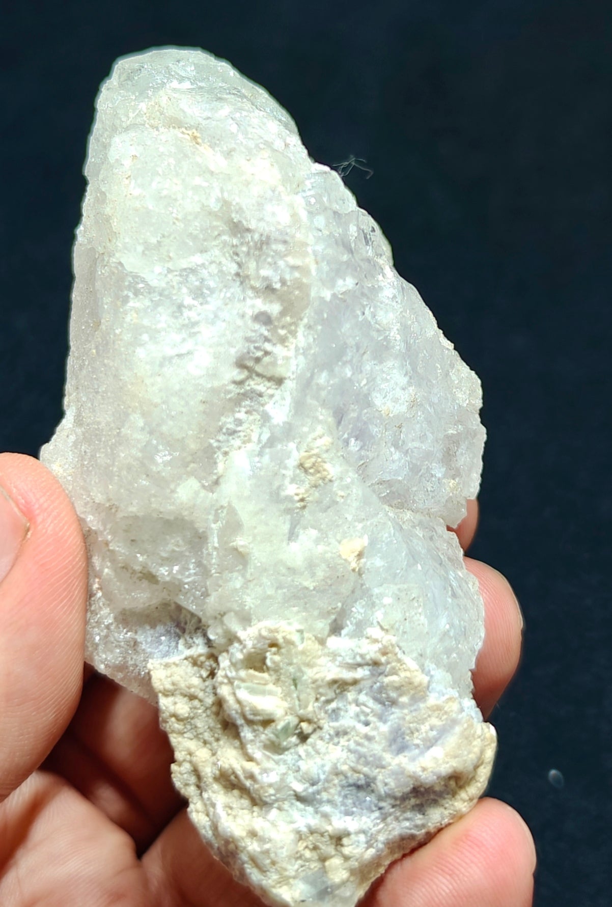 Natural etched pollucite with green tourmalines 260 grams