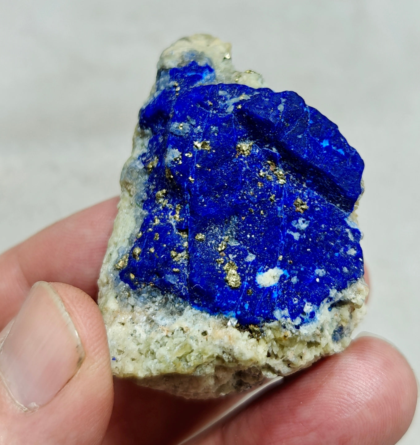 An Aesthetic specimen of Lazurite Lapis with Pyrite partly fluorescent 57g