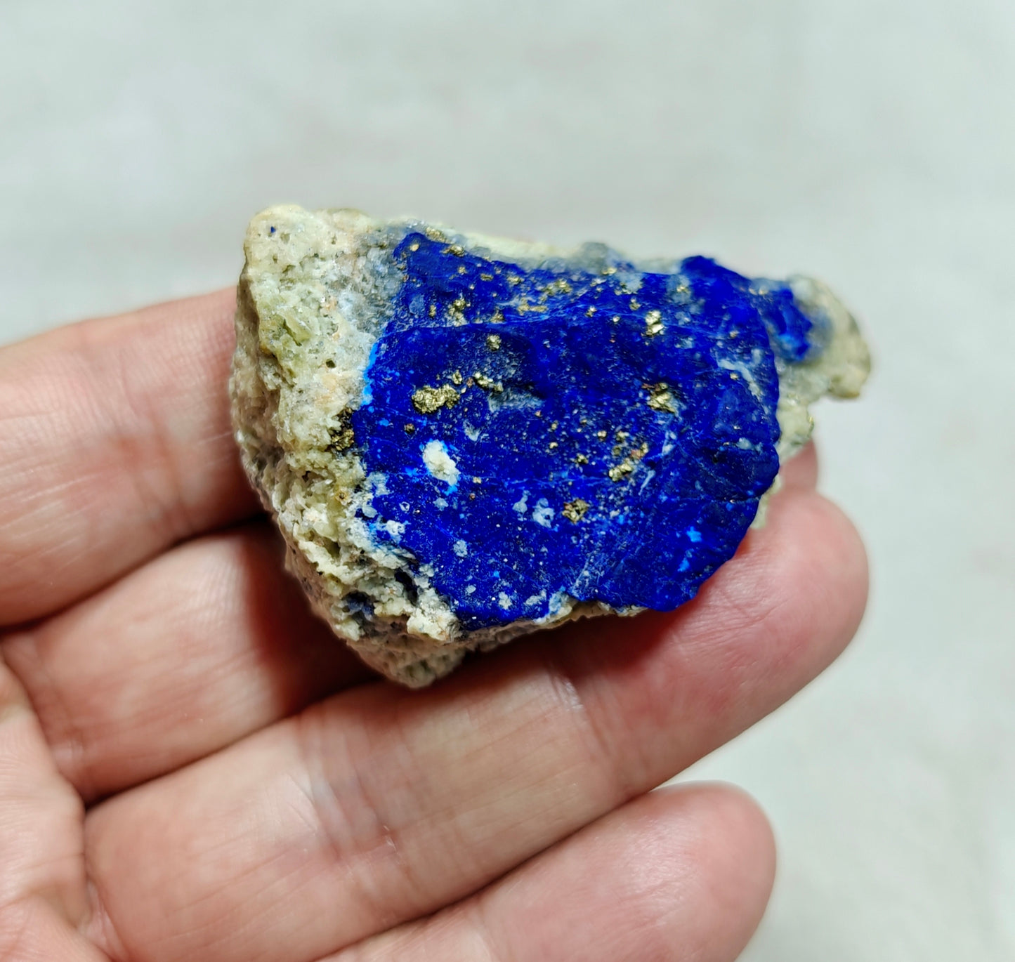 An Aesthetic specimen of Lazurite Lapis with Pyrite partly fluorescent 57g