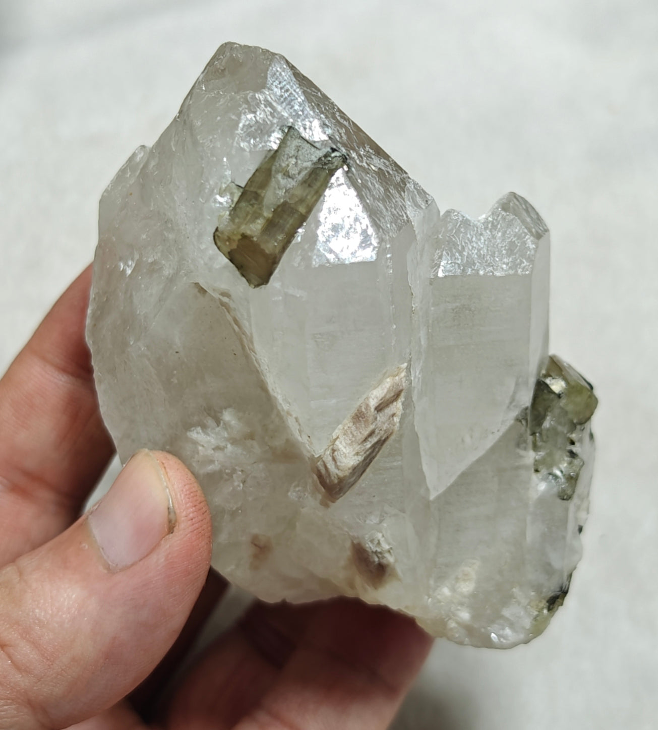 An amazing beautiful specimens of light pink and green Tourmaline embedded in terminated quartz 323g
