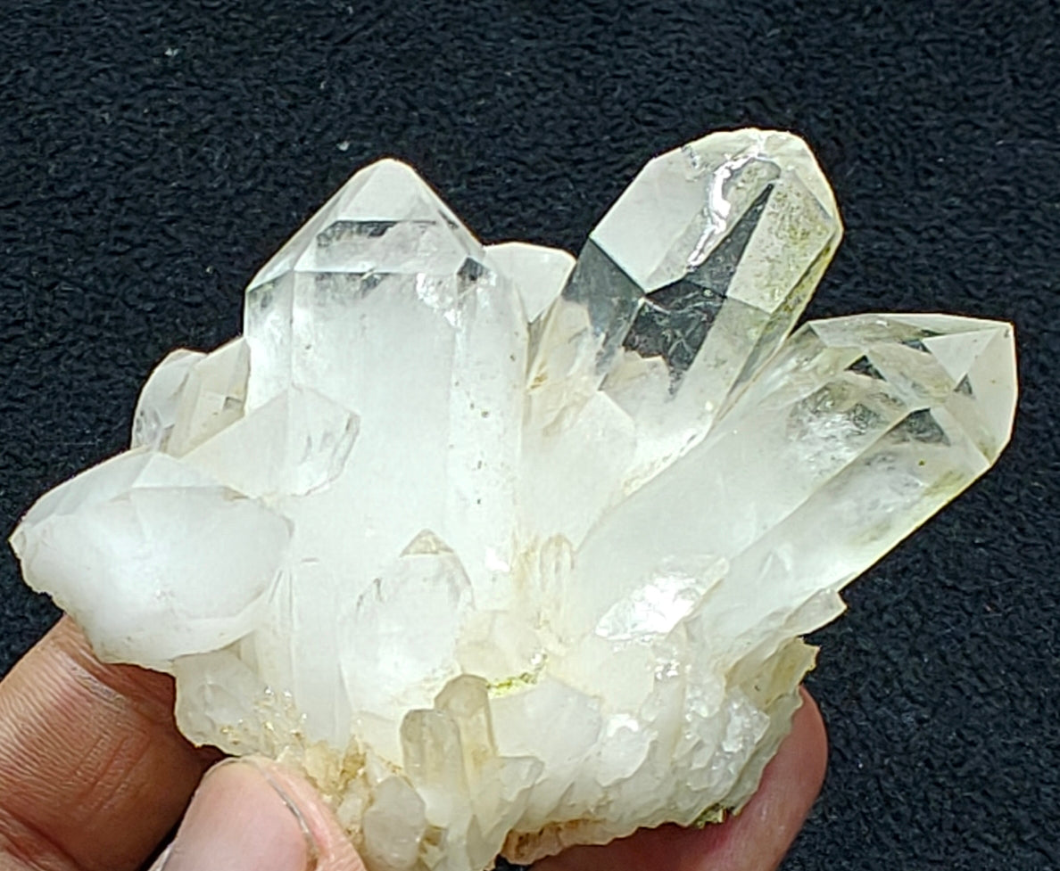 An amazing self standing quartz cluster with Epidote inclusions 160 grams