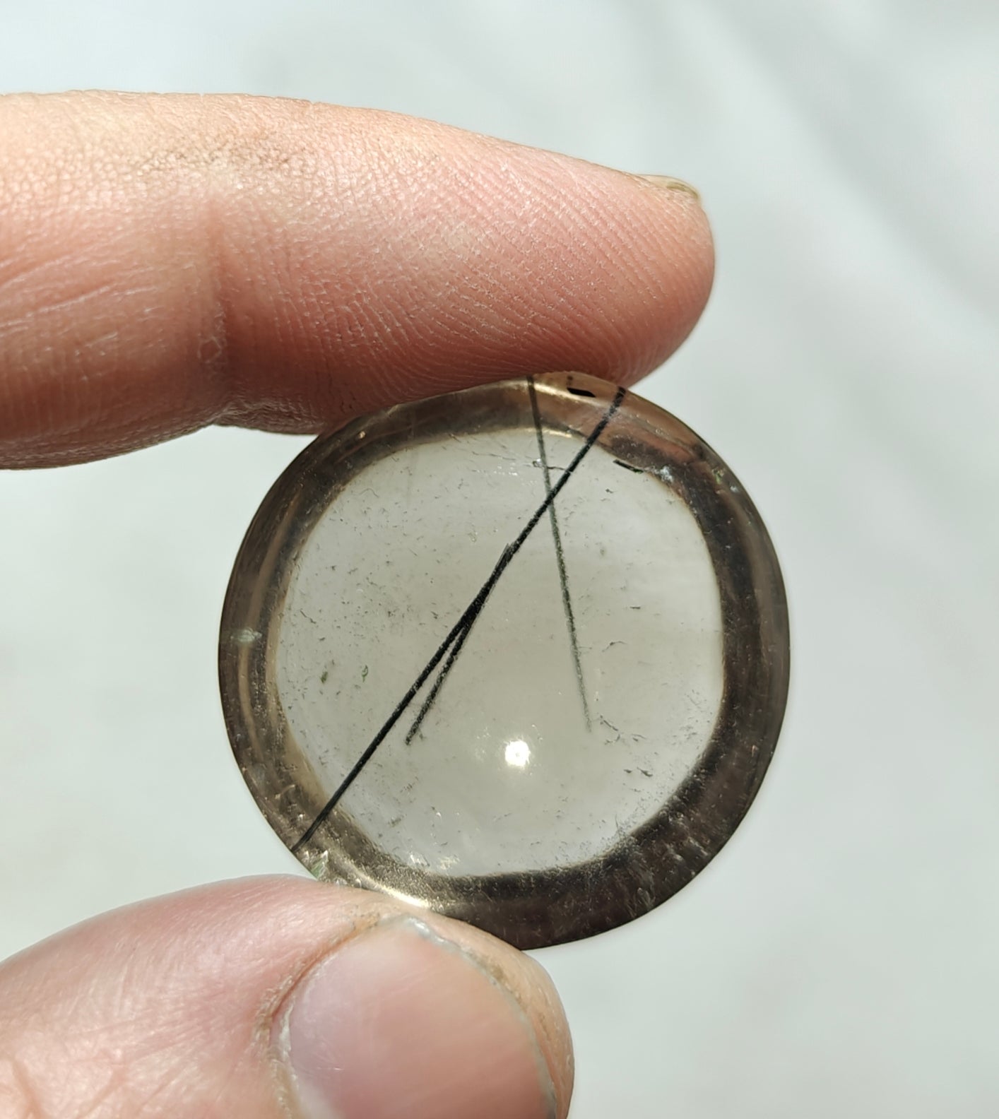 Tourmaline included smoky Quartz cabochon 64 carats