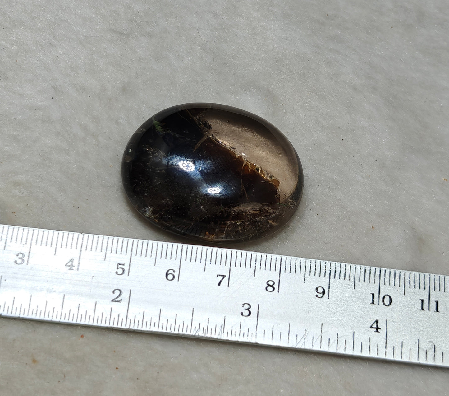 Mica included Quartz cabochon 136 carats