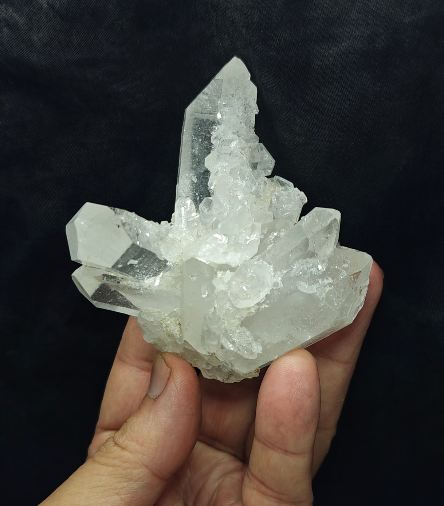 An amazing specimen of clear terminated quartz Crystals 193 grams