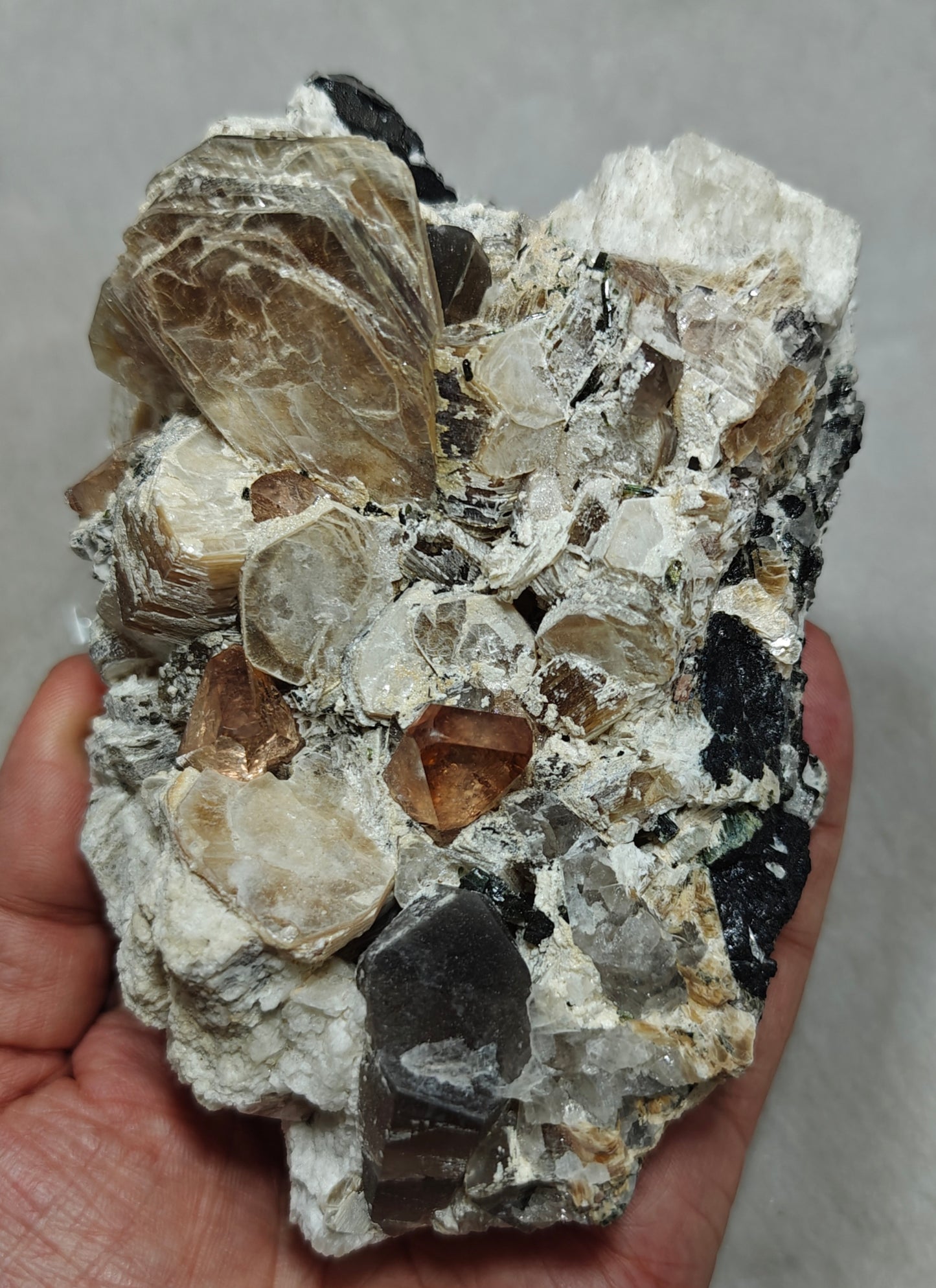 peach color Topaz crystals on matrix 686 grams