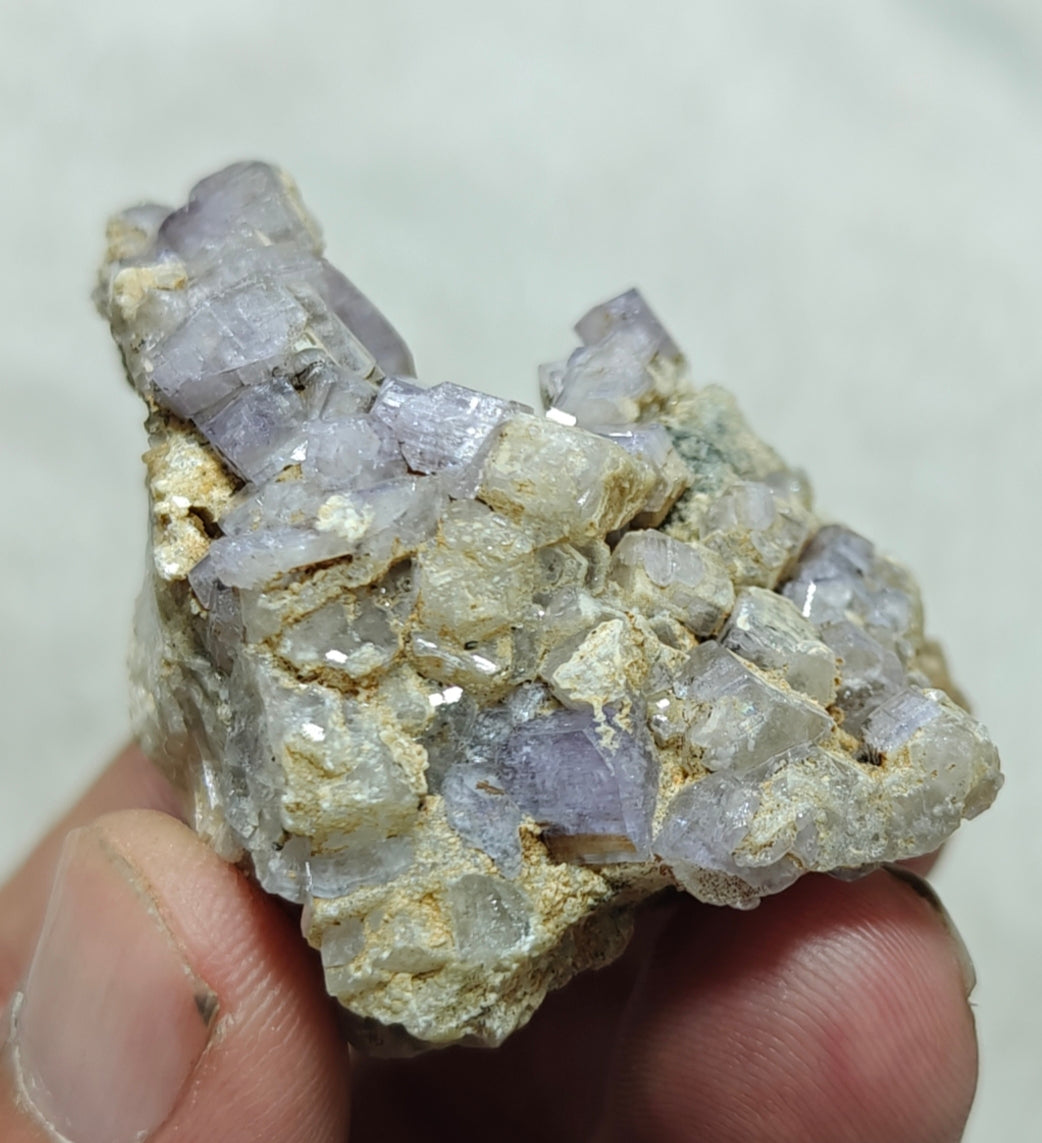 An amazing specimen of purple Apatite crystals on matrix 57 grams