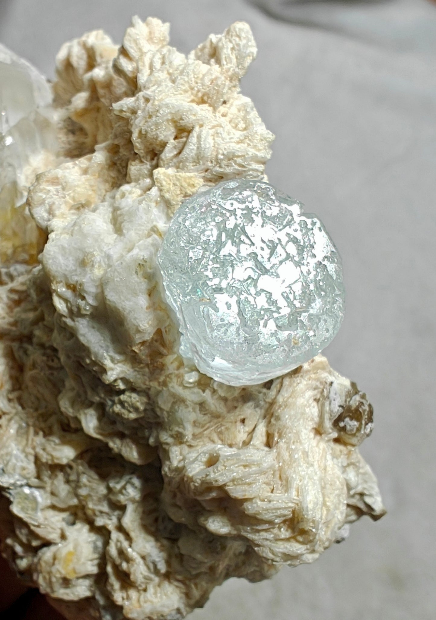 An aesthetic Specimen of etched Aquamarine on matrix with quartz 206 grams