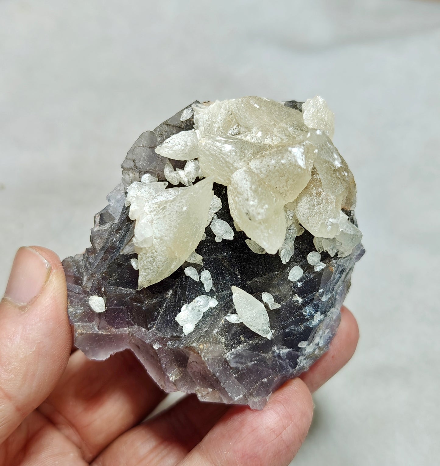 An amazing Single beautiful specimen of grey fluorite with calcite crystals 165 grams