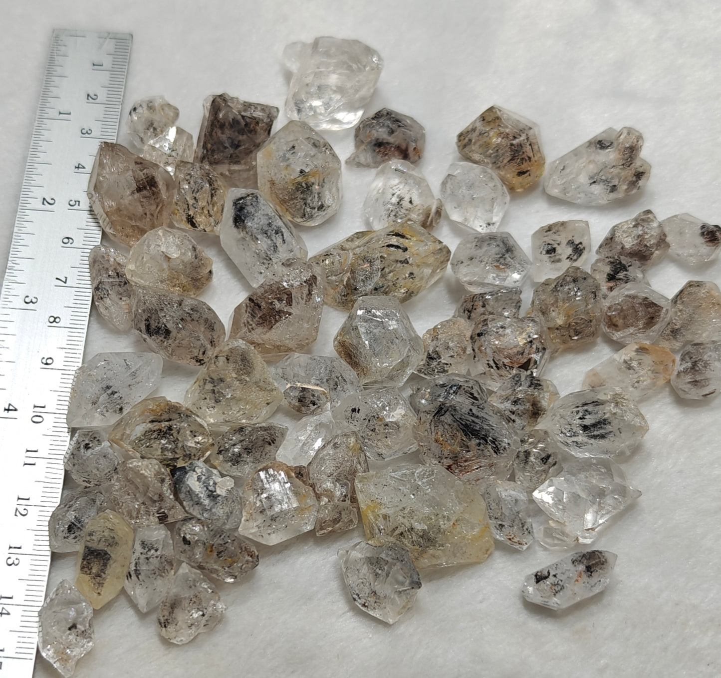 220 grams diamond quartz crystals some with carbon inclusions