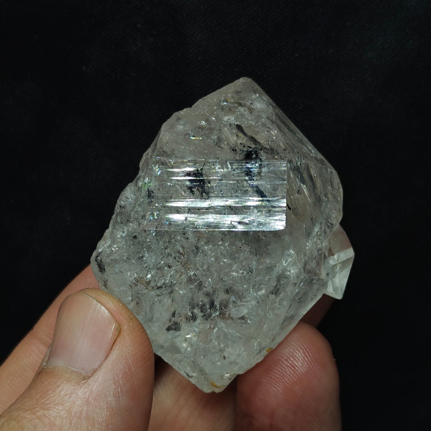 double terminated diamond like quartz crystal with carbon inclusions 57 grams