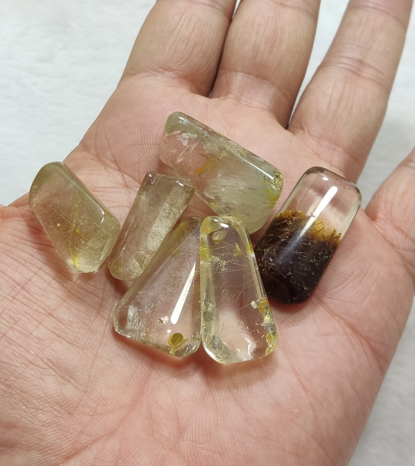 An amazing lot of Rutilated polished quartz tumbles 50 grams