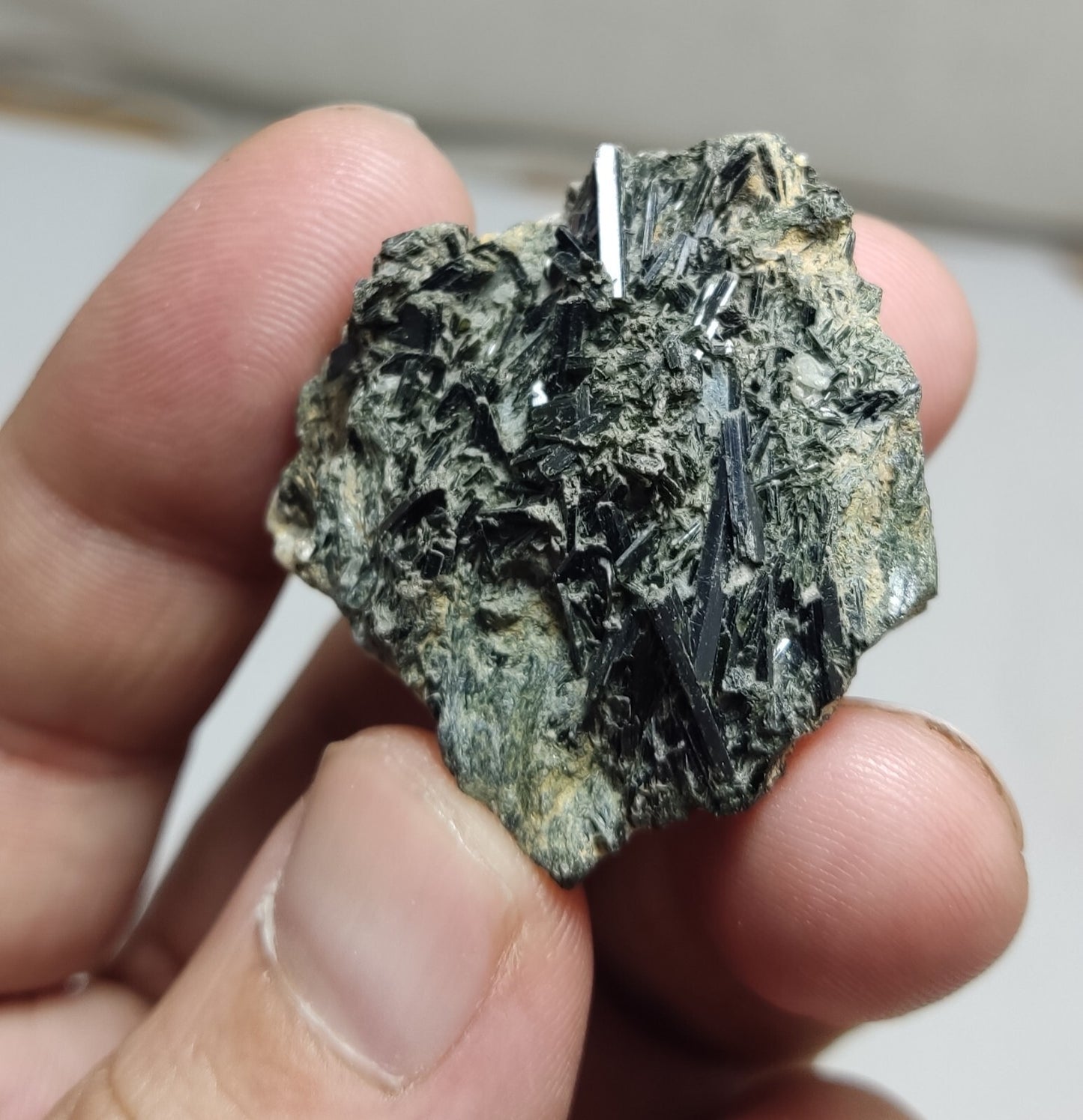 An aesthetic specimen of terminated aegirine crystals on matrix 26 grams