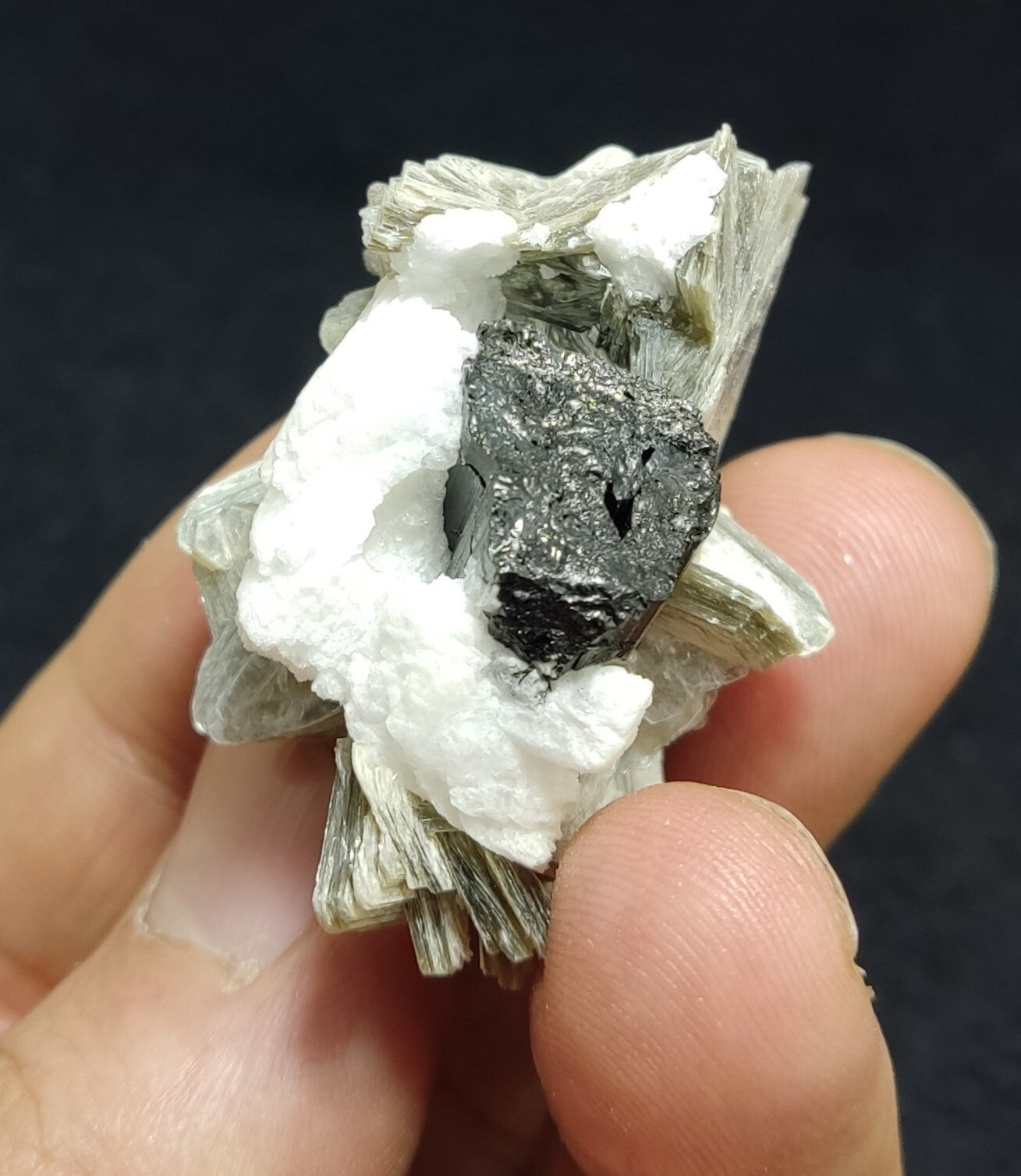 An Aesthetic combo specimen of feldspar, Tourmaline, muscovite 28 grams