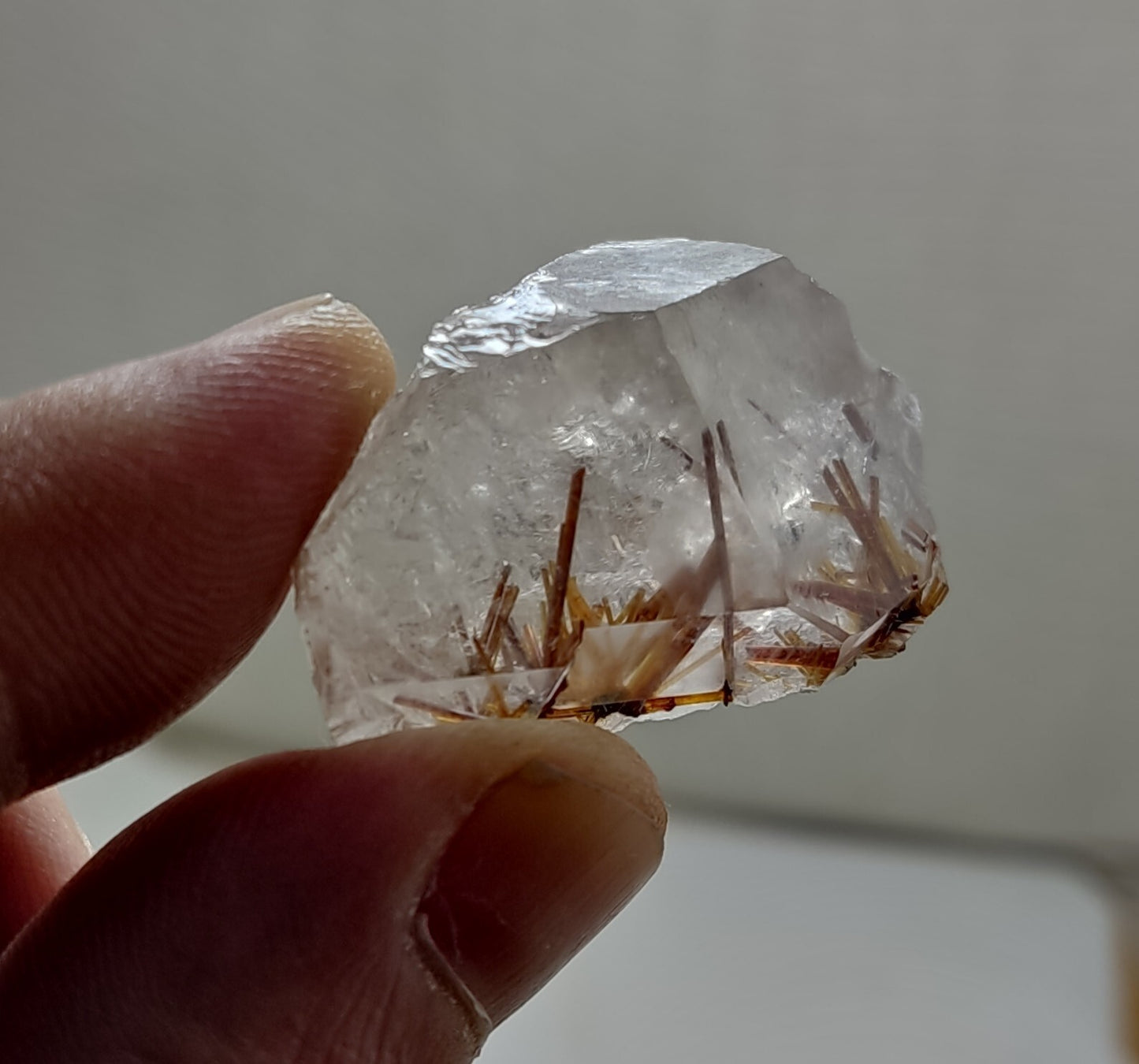 An aesthetic specimen of quartz with rutile inclusions 25 grams