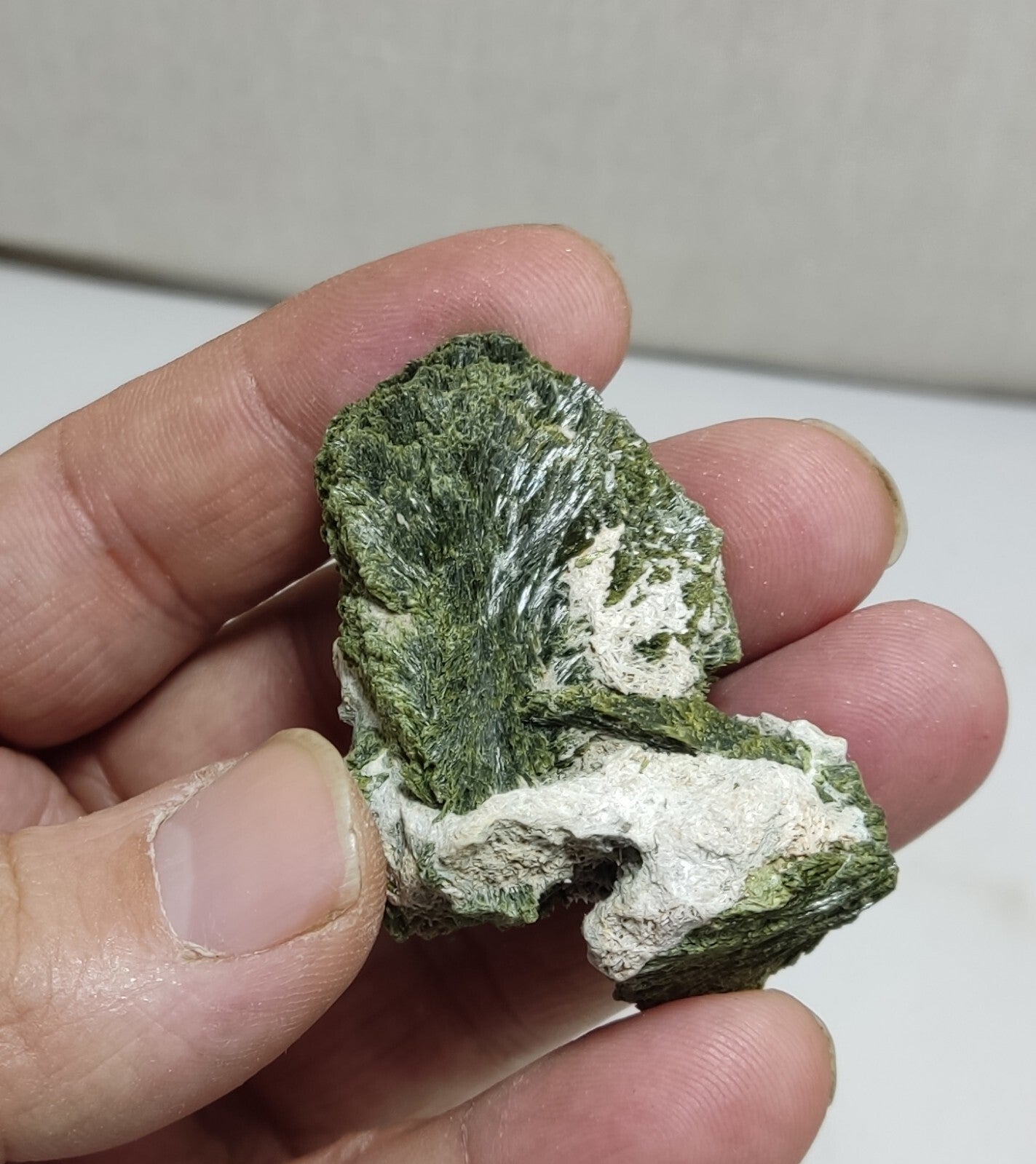 An aesthetic specimen of epidote crystal spray type 34 grams