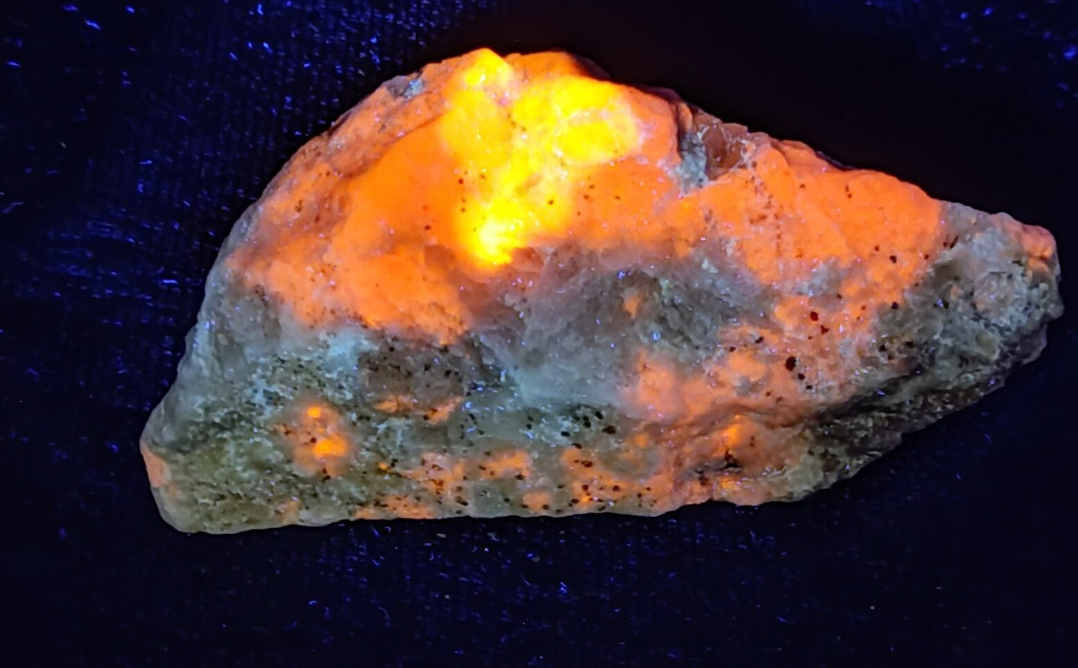 An amazing specimen of fluorescent rough hackmanite chunk 237 grams