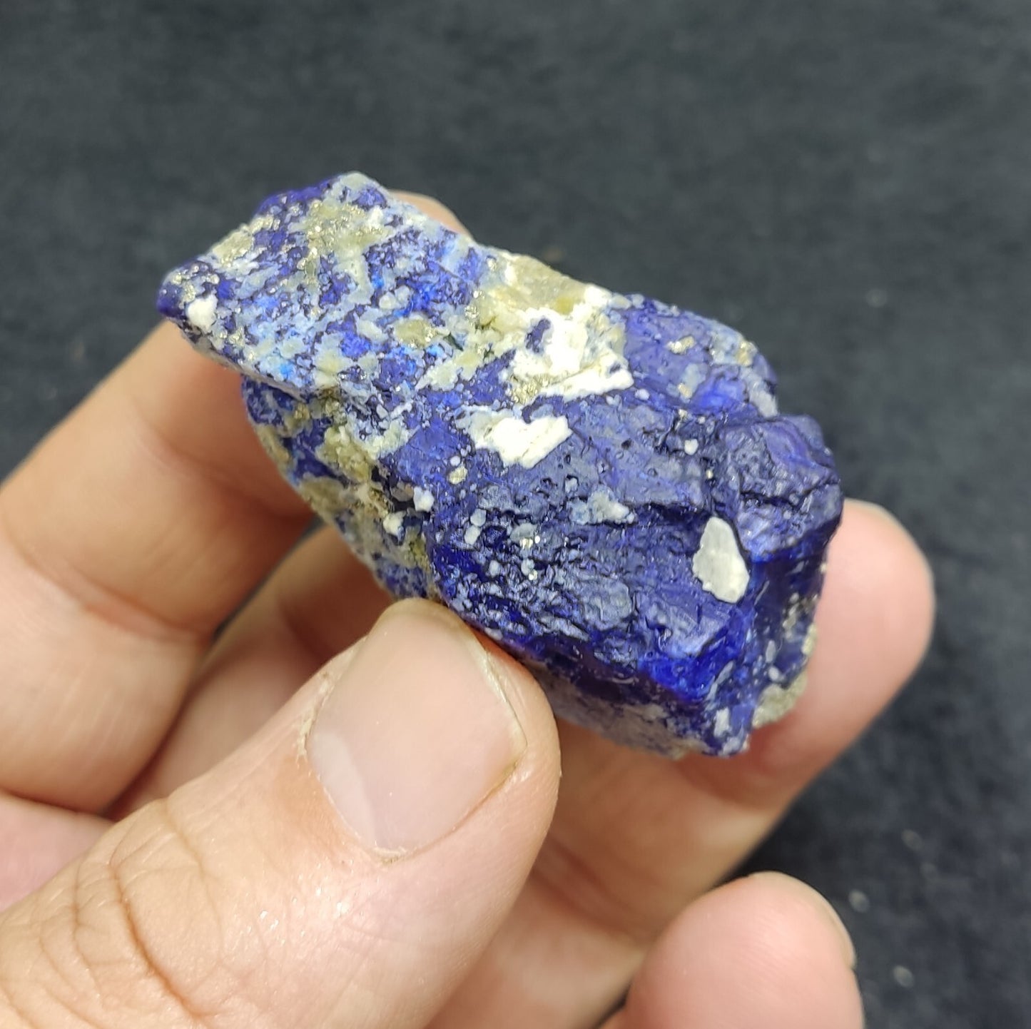 An Aesthetic specimen of fluorescent Lazurite with pyrite 65 grams