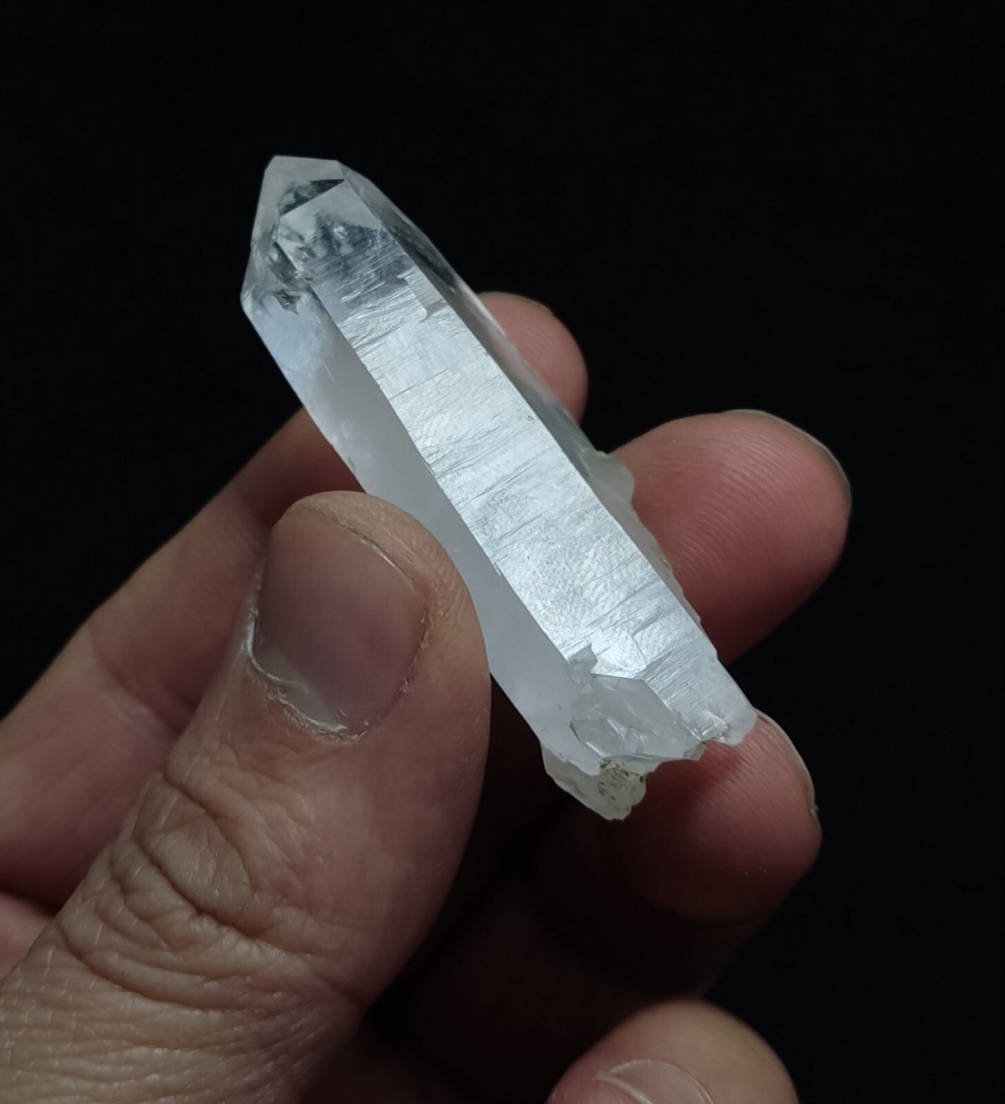 An Aesthetic terminated Quartz crystal with chlorite inclusions 27 grams