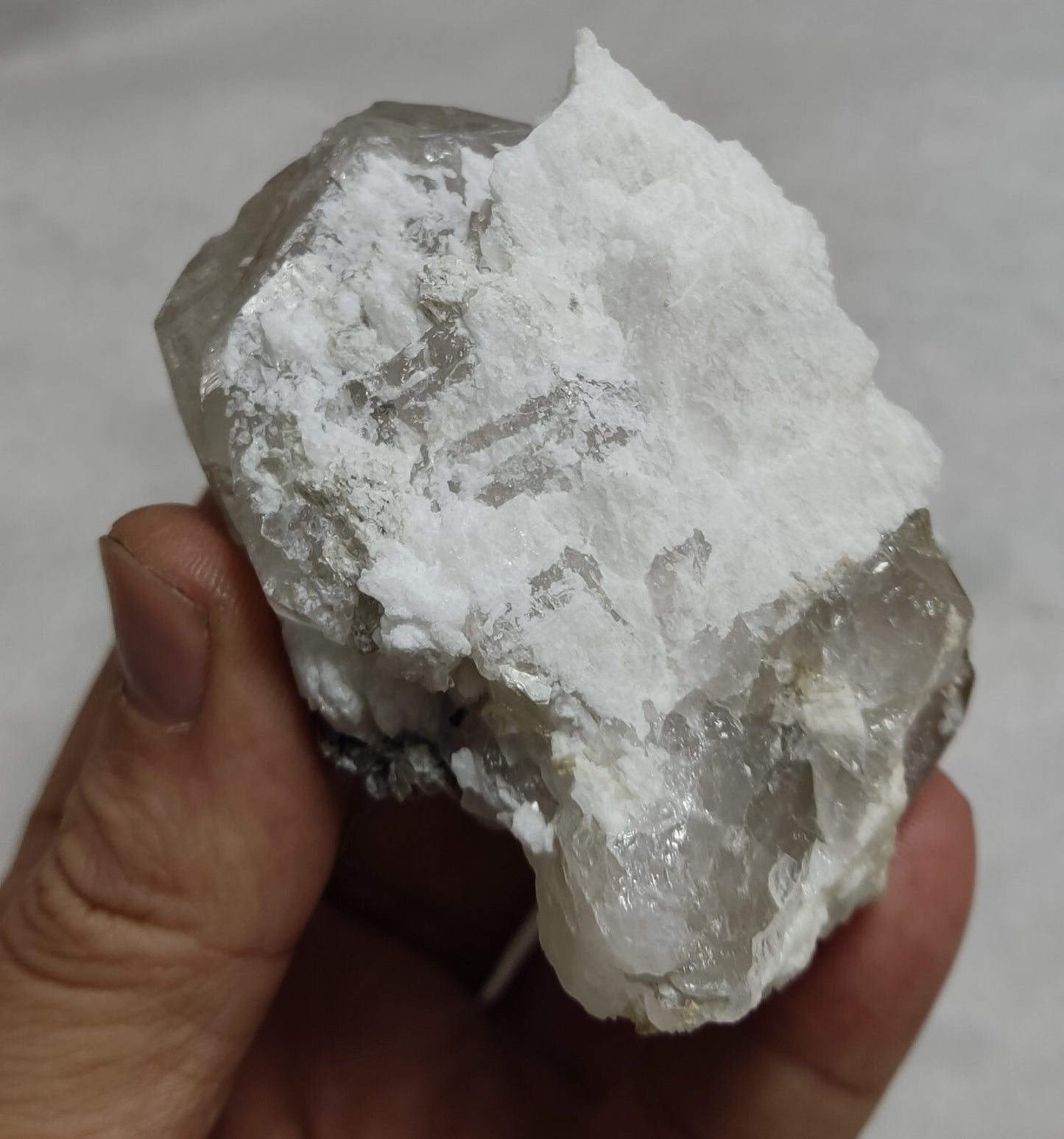 An amazing specimen of quartz with muscovite and albite 260 grams