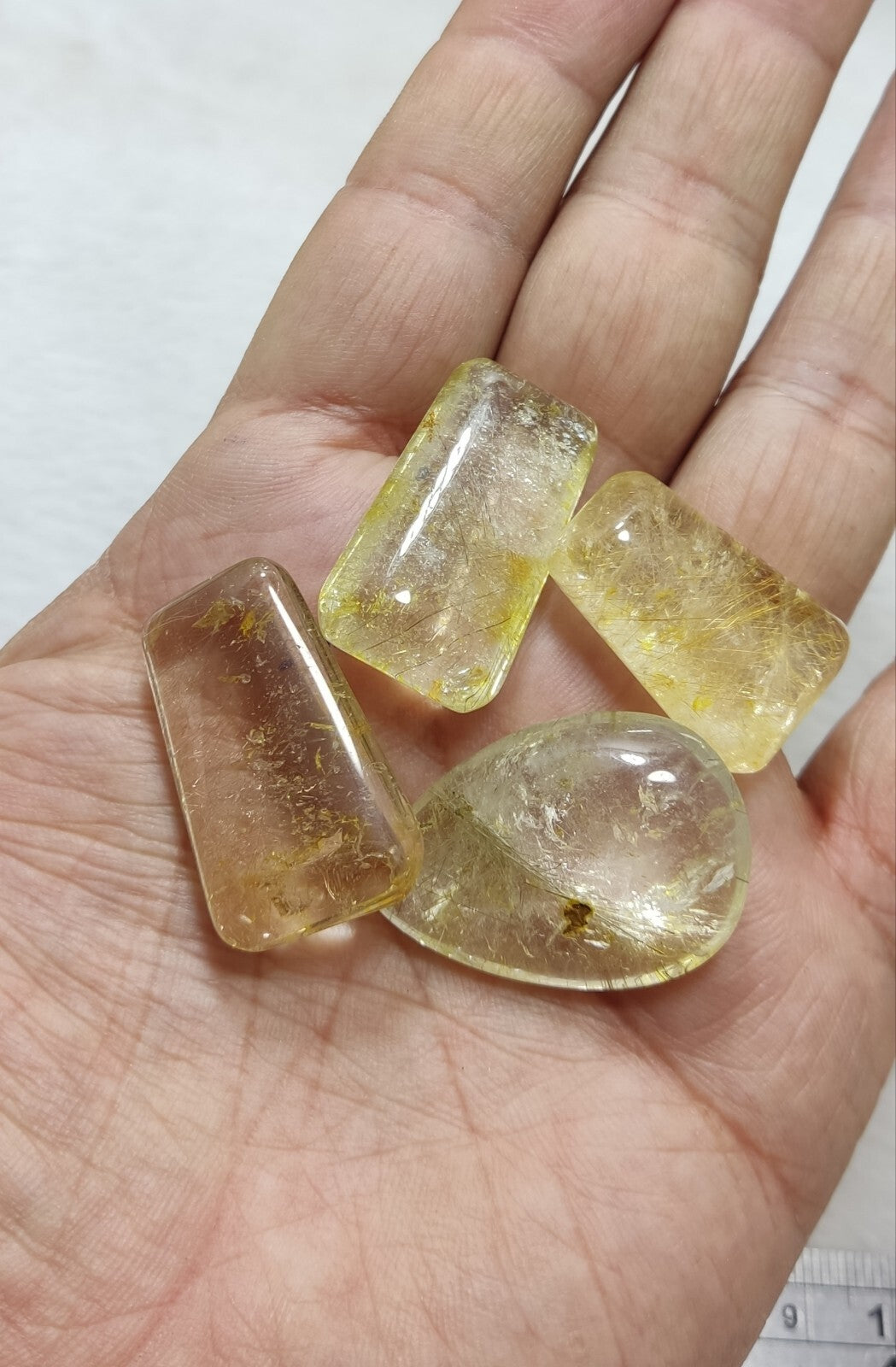 An amazing lot of Rutilated polished quartz tumbles 45 grams