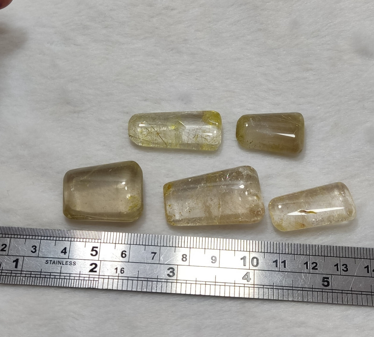 An amazing lot of Rutilated polished quartz tumbles 45 grams
