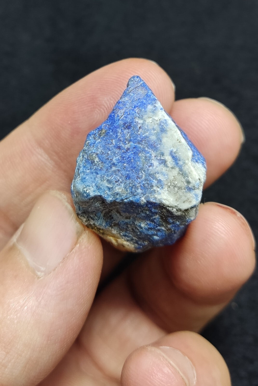 An Aesthetic specimen of fluorescent lapis/lazurite on matrix 23 grams