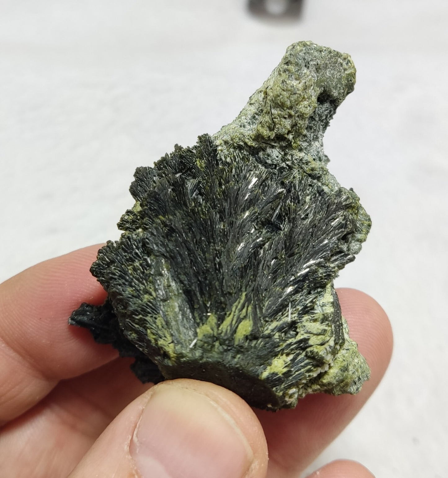 An aesthetic specimen of epidote crystal spray type 66 grams