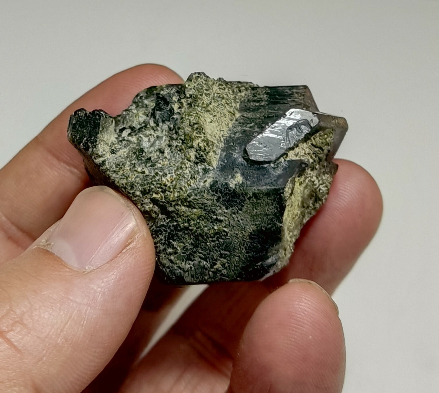 An aesthetic specimen of dark green color Epidote crystals 79 grams