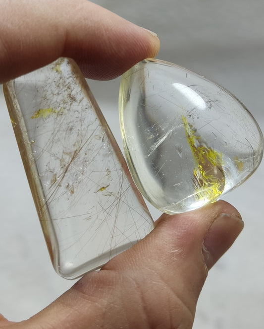 An amazing collection of 2 Rutilated polished quartz tumbles 46 grams