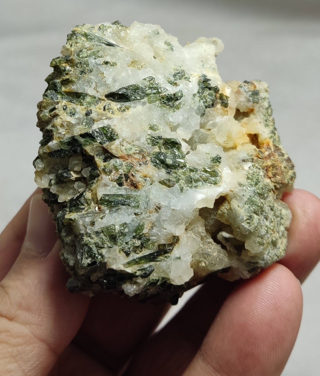 An aesthetic specimen of green color diopside 143 grams
