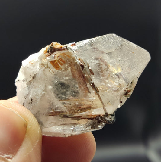 An aesthetic specimen of quartz with hematite and rutile inclusions 28 grams