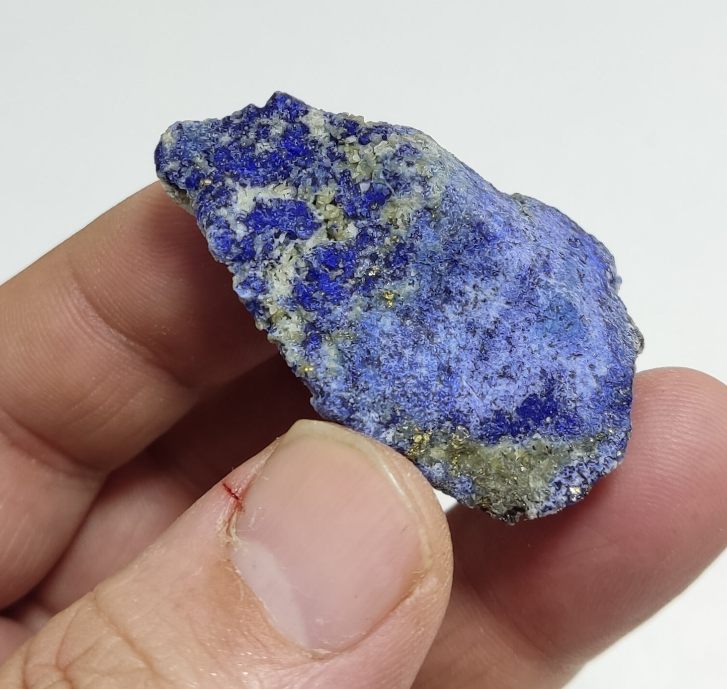 An Aesthetic specimen of fluorescent Lazurite with pyrite 27 grams