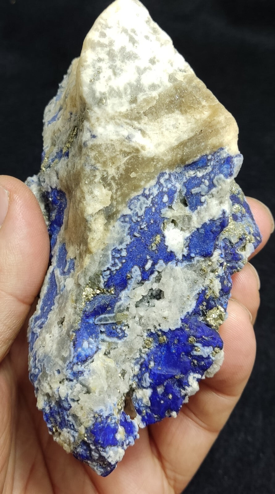 An Aesthetic specimen of fluorescent Lazurite with pyrite 489 grams