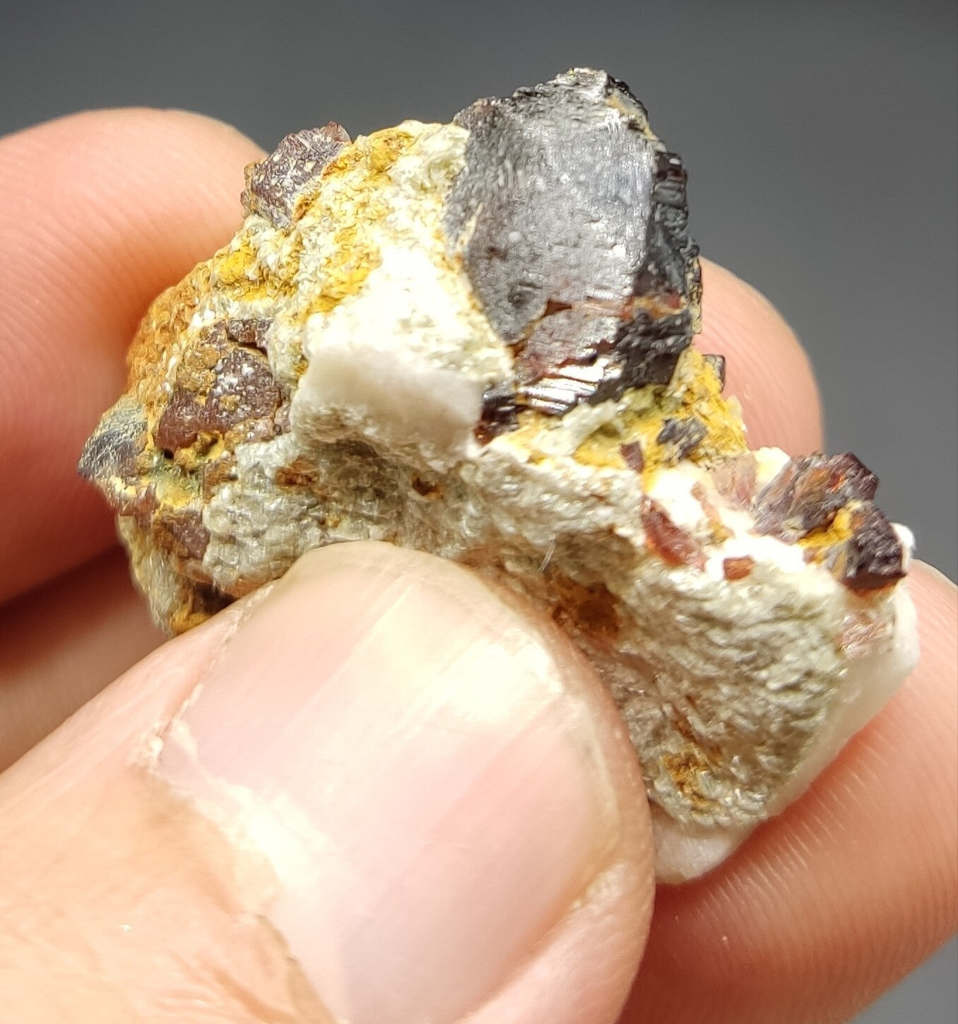 An aesthetic specimen of spessartine garnets on albite/feldspar 15 grams