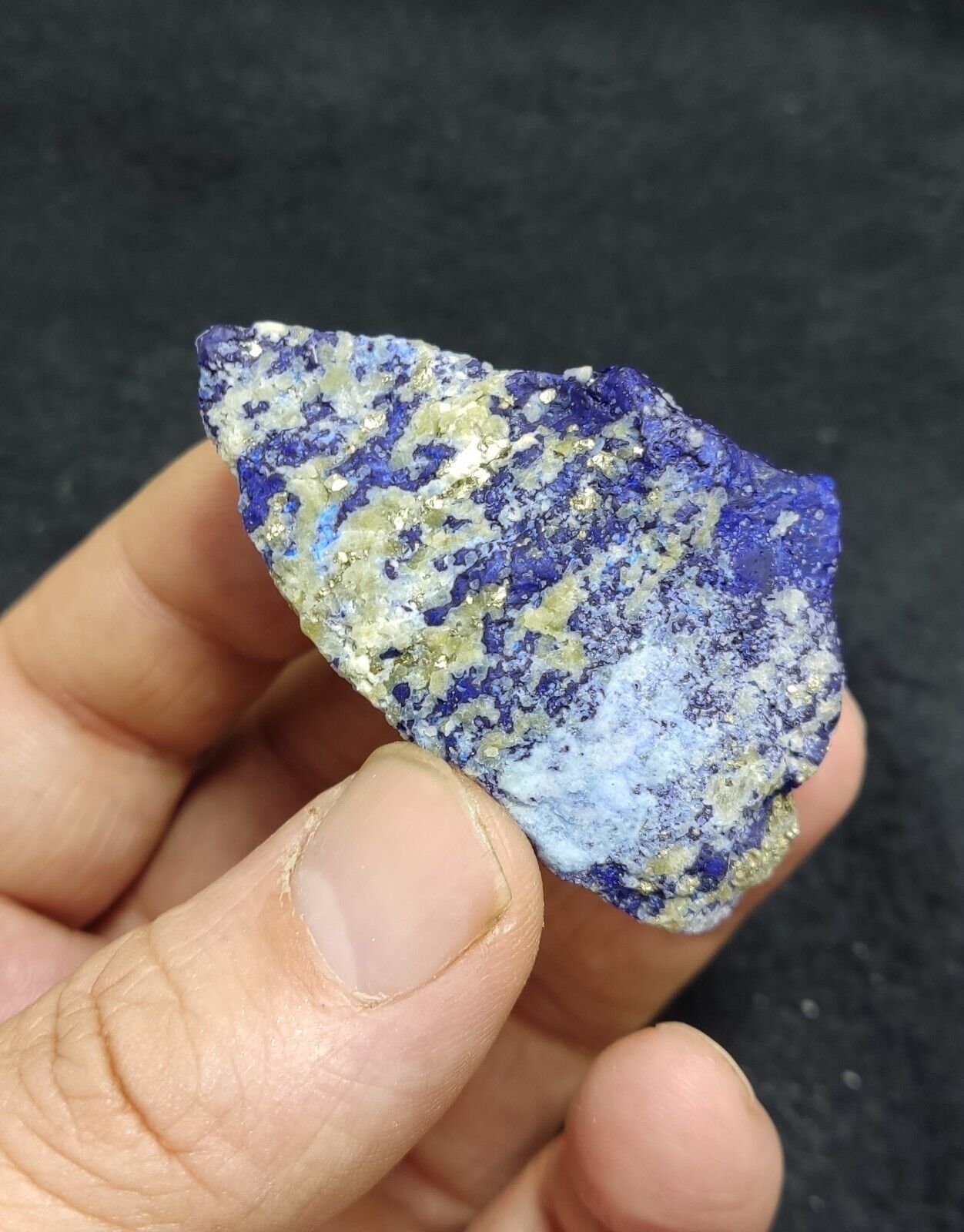 An Aesthetic specimen of fluorescent Lazurite with pyrite 65 grams