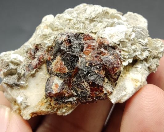 An aesthetic specimen of spessartine garnets on muscovite 58 grams