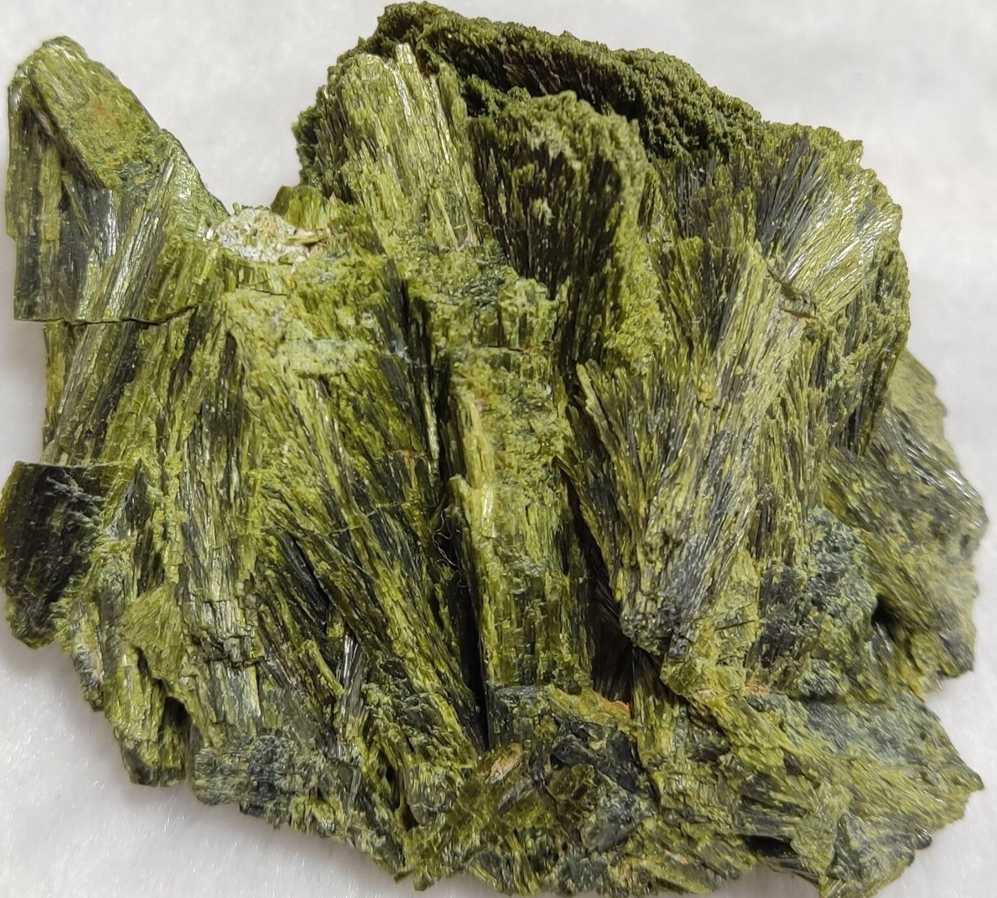 An aesthetic specimen of epidote crystal cluster 208 grams