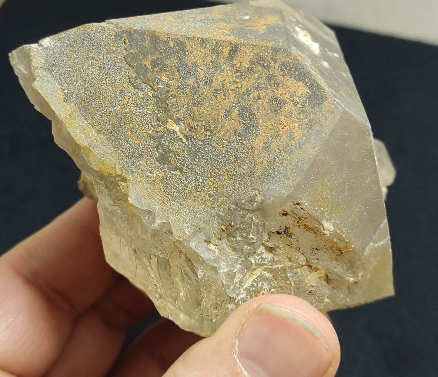 An Aesthetic terminated Quartz floater with rutiles and hematite 399 grams